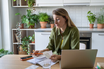 Disappointed sad woman deal with paperwork related to apartment expenses, tracking payments, income control. Finance challenges, overdue accounts, fiscal responsibility, money trouble, recipe analysis