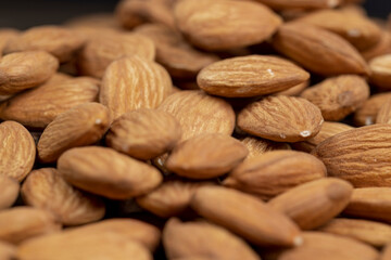 edible delicious and crunchy brown almonds, closeup