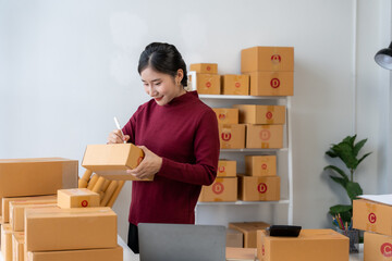 Asian Woman Packaging Boxes for Shipment