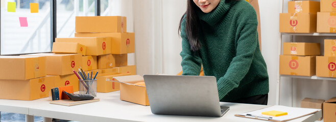 Woman Preparing Packages for Shipment