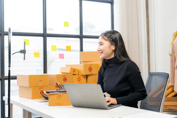 Asian Woman Managing Online Business