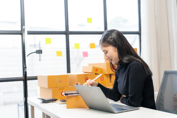 Woman Managing Online Business at Home