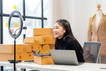 Asian Woman Entrepreneur Livestreaming at Home Office