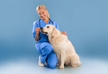 Veterinary Clinic Service Concept. Happy Female Nurse In Scrubs Uniform And Stethoscope Posing With...