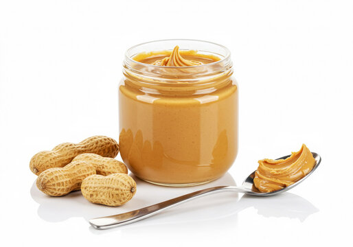 Peanut butter jar and tablespoon on reflective white background