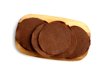 Fermented soybean discs, known as “Thua Nao,” a traditional Thai seasoning used to enhance flavor in Northern cuisine.