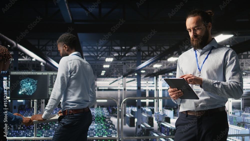 Poster server room technician next to coworkers reviewing neural network code and llm visualization dashboa