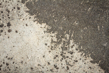 Texture of Rough Gray Concrete Surface with Visible Grain, Cracks, and Rugged Details. Perfect for...