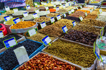 Various legumes and nuts products offered for sale.