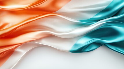Fototapeta premium A close-up view of luxurious silk fabric displaying elegant orange and teal colors, symbolizing movement, elegance, and artistic expression in fashion design.