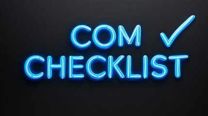 Neon sign displaying the words "COM CHECKLIST" with a checkmark.