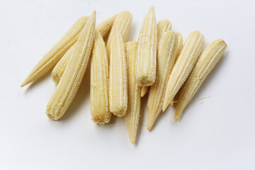 Fresh baby corn on white background.