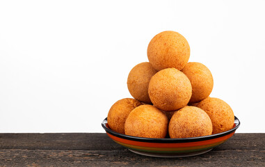 Colombian buñuelos piled high in a pyramid - Typical Colombian cuisine
