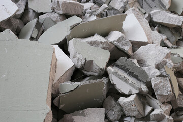 Broken concrete, Piles of lightweight construction bricks after house demolition