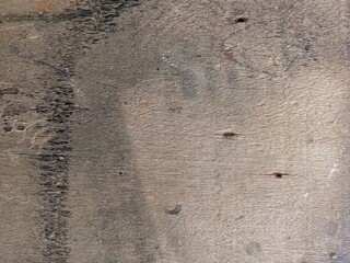 Weathered Plywood Surface with Distressed Gray Stains