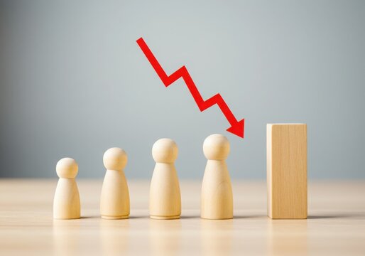 Wooden figures with downward arrow showing decline