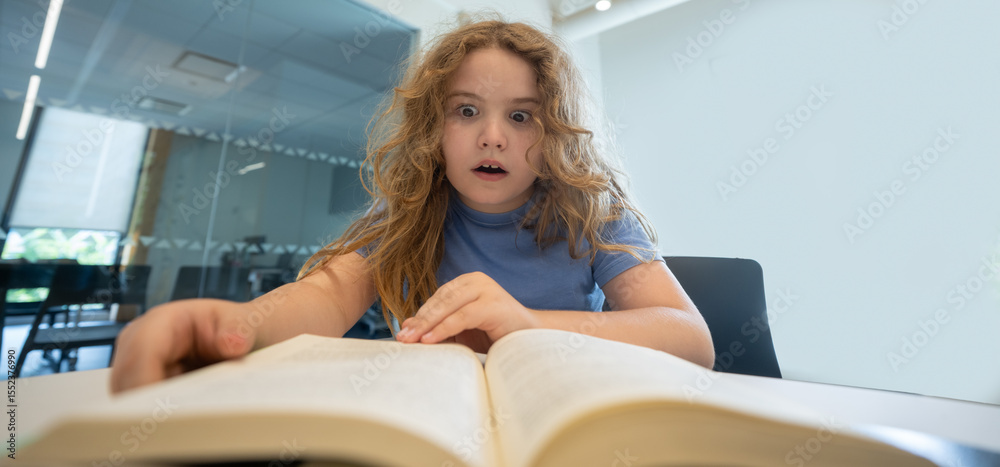 Aufkleber Child reading book at library. Kid studying and reading. Smart kid read book. Little student learning from book. Child reading book in library. Education and Learning. Knowledge through reading.