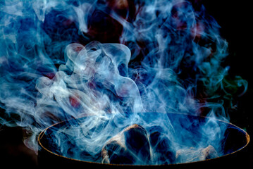 wisping smoke rising