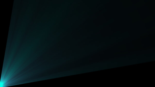 Illuminated light beam emerging from the bottom left corner on a black dark background radiating brightness and mystery.