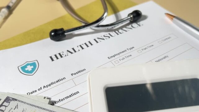 Health Insurance Document on Wooden Desk &ndash; Medical Coverage Concept