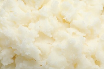 Texture of organic shea butter as background, top view