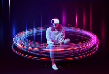 Woman using virtual reality headset and controller against dark background. Bright neon lines...