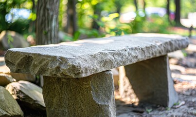 Fototapeta premium Stone bench in natural green setting for outdoor relaxation and serenity