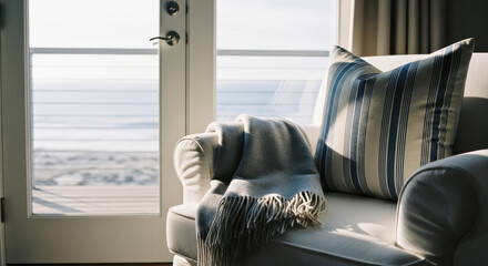 Striped chair with ocean view through window, coastal living room for vacation rental and seaside lifestyle website banners