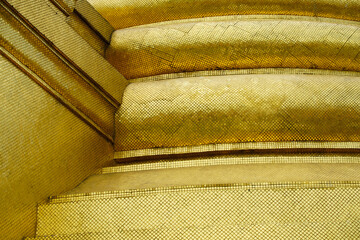 Detailed View of Golden Mosaic Tiles with Shimmering Texture