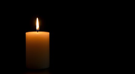 bereavement candle. Lit memorial candle against solid black background, perfect for sympathy cards, remembrance visuals, or spiritual reflections.