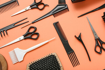 Composition with hairdressing accessories on red background