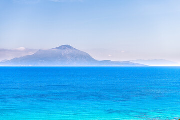 Fototapeta premium Samos, Fournoi islands from horizon at Ikaria island, Greece Aegean Ikarian sea of Mediterranean in longevity blue zone and azure blue water