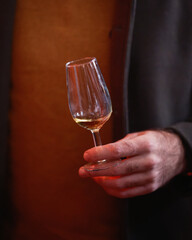 man holding a glass