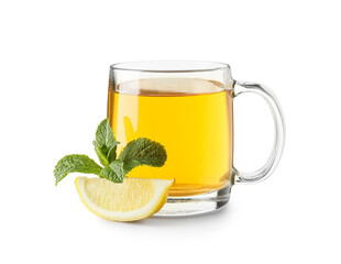 Glass cup of hot mint tea with piece of lemon on white background