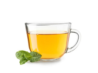 Glass cup of hot mint tea on white background