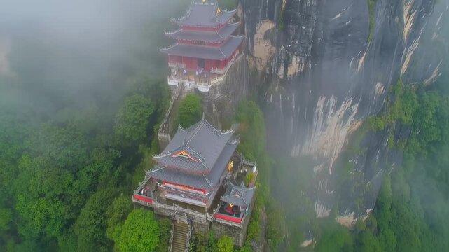 Aerial view of Fanjing Mountain Temple in Guizhou, China on a foggy day