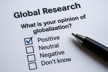 Fototapeta premium Positive opinion about globalization marked on survey form with pen reflecting impact of globalization on global research