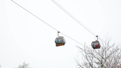 go up the mountain by cable car