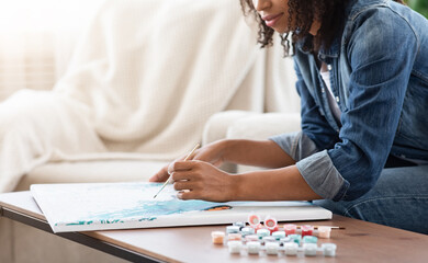 Quarantine Leisure. Closeup Of Young African Woman Drawing Picture At Home, Cropped Image