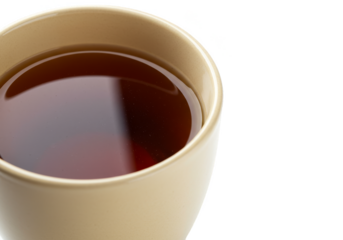 Isolated Studio Shot of Brown Hot Tea in Ceramic Cup on Transparent Background