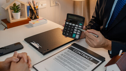 staff is explaining the information about the house lease contract documents to the buyer, the...