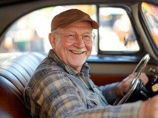Senior man driving classic car.  Happy and relaxed