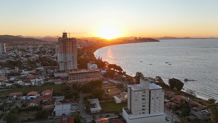 First light touches the ocean as the day begins — golden skies, calm seas, and nature in perfect...