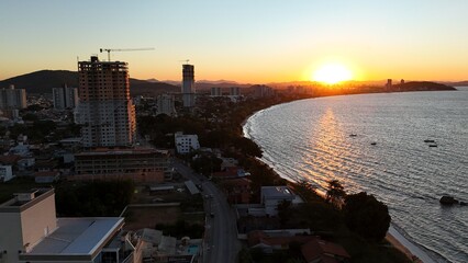 First light touches the ocean as the day begins — golden skies, calm seas, and nature in perfect...