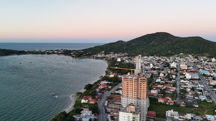 First light touches the ocean as the day begins — golden skies, calm seas, and nature in perfect...