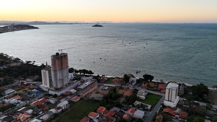 First light touches the ocean as the day begins — golden skies, calm seas, and nature in perfect...