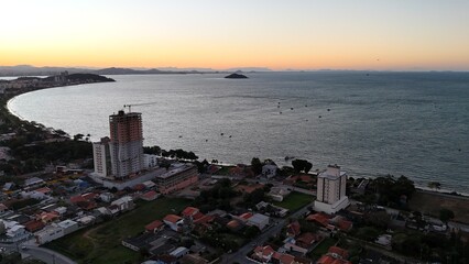 First light touches the ocean as the day begins — golden skies, calm seas, and nature in perfect...