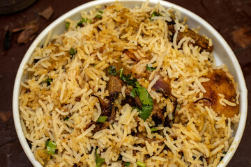 Delicious Vegan Biryani Made with Tender Jackfruit in a Bowl – Concept of Plant-Based Indian...