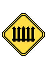 Yellow diamond sign, black railway tracks, warning for train crossing.
Rambu berlian kuning, jalur kereta api hitam, peringatan perlintasan kereta.
 Railroad crossing warning sign, four vertical black