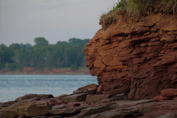 the red coastal cliff in prince edward island Canada. High quality photo
